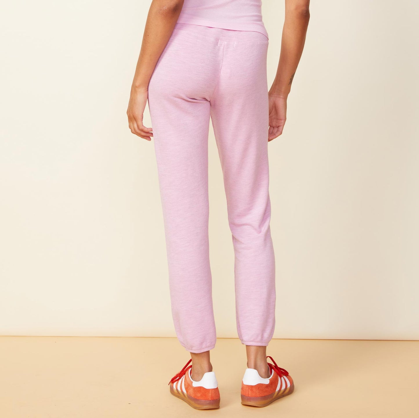 Back view of model wearing the supersoft vintage sweats in pink lavender.