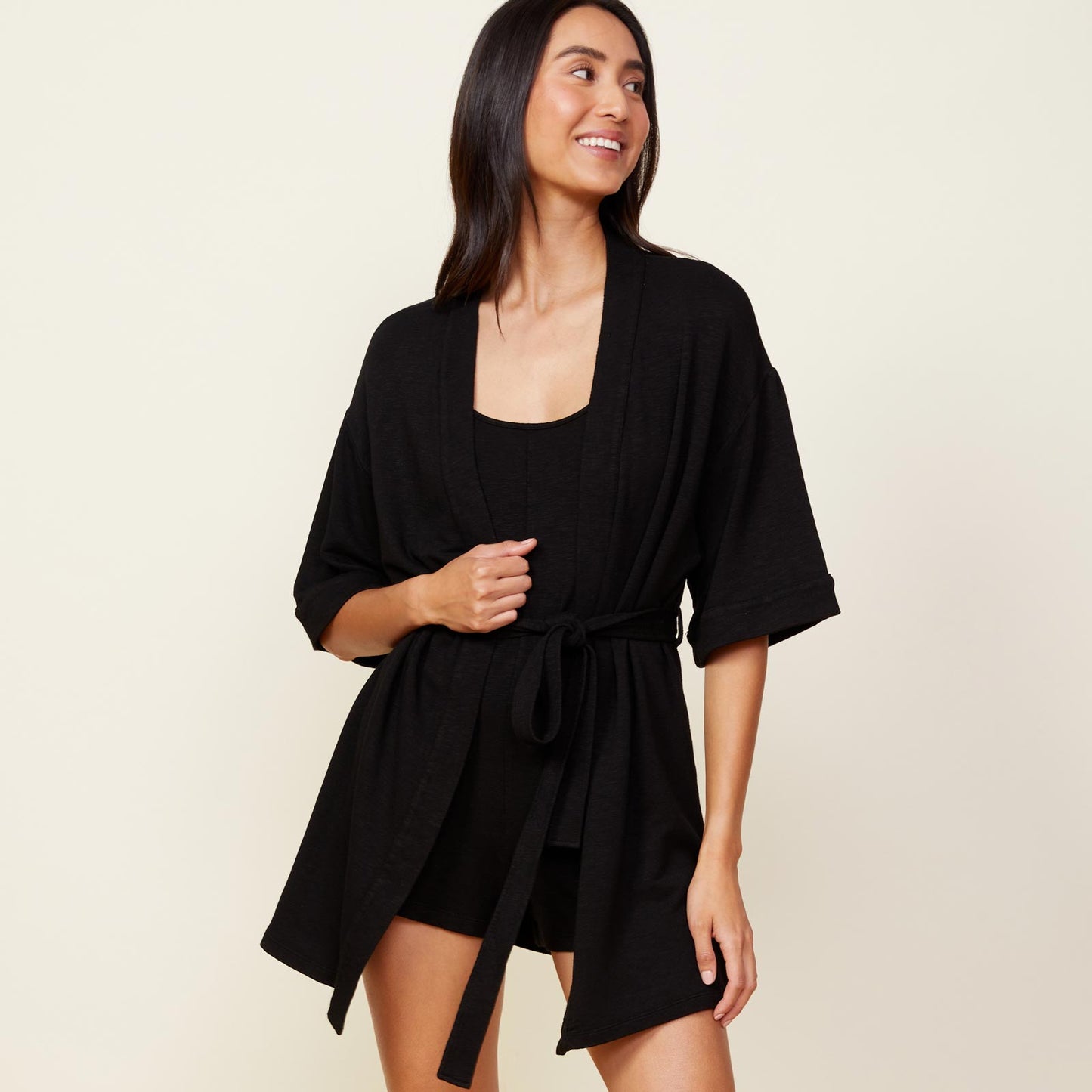 Front view of model wearing the supersoft robe in black.