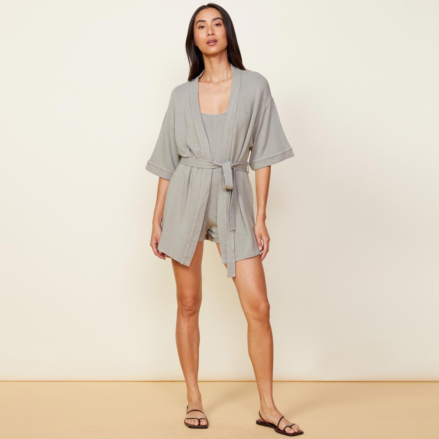 Front view of model wearing the supersoft robe in green tea.