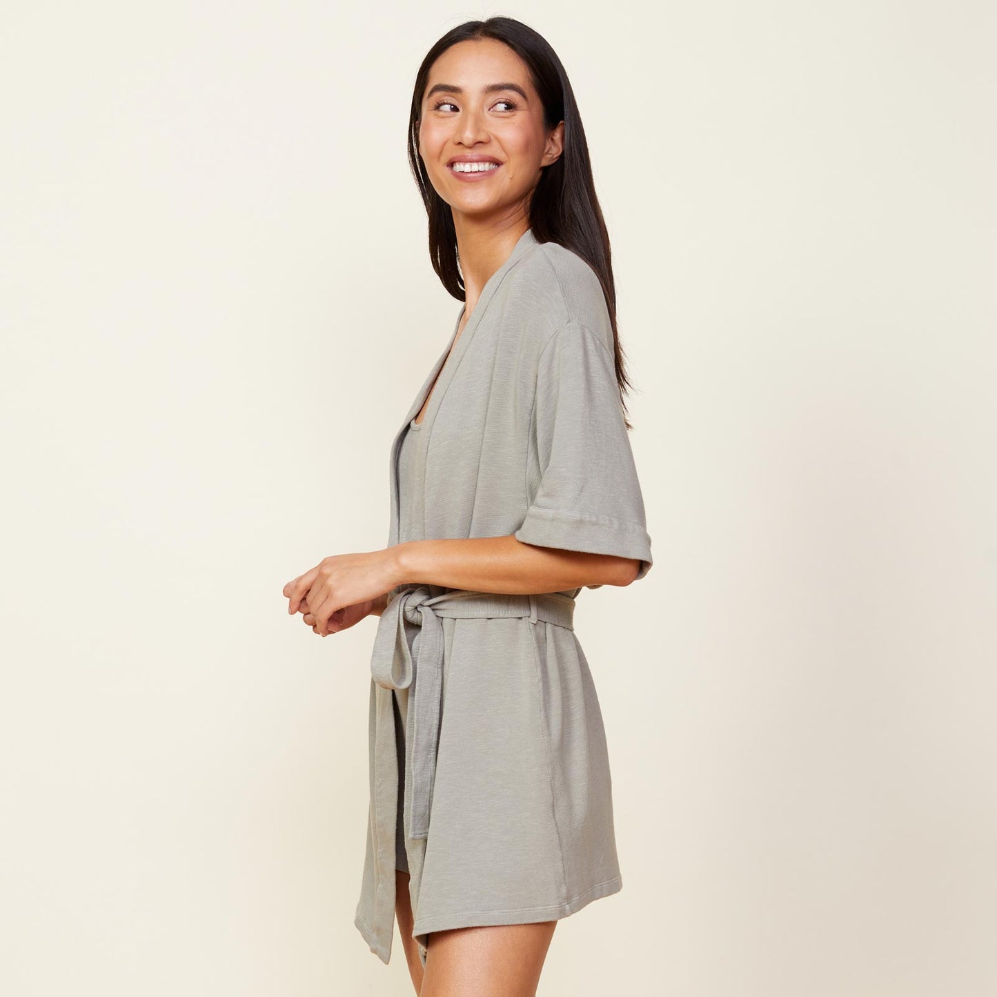 Side view of model wearing the supersoft robe in green tea.