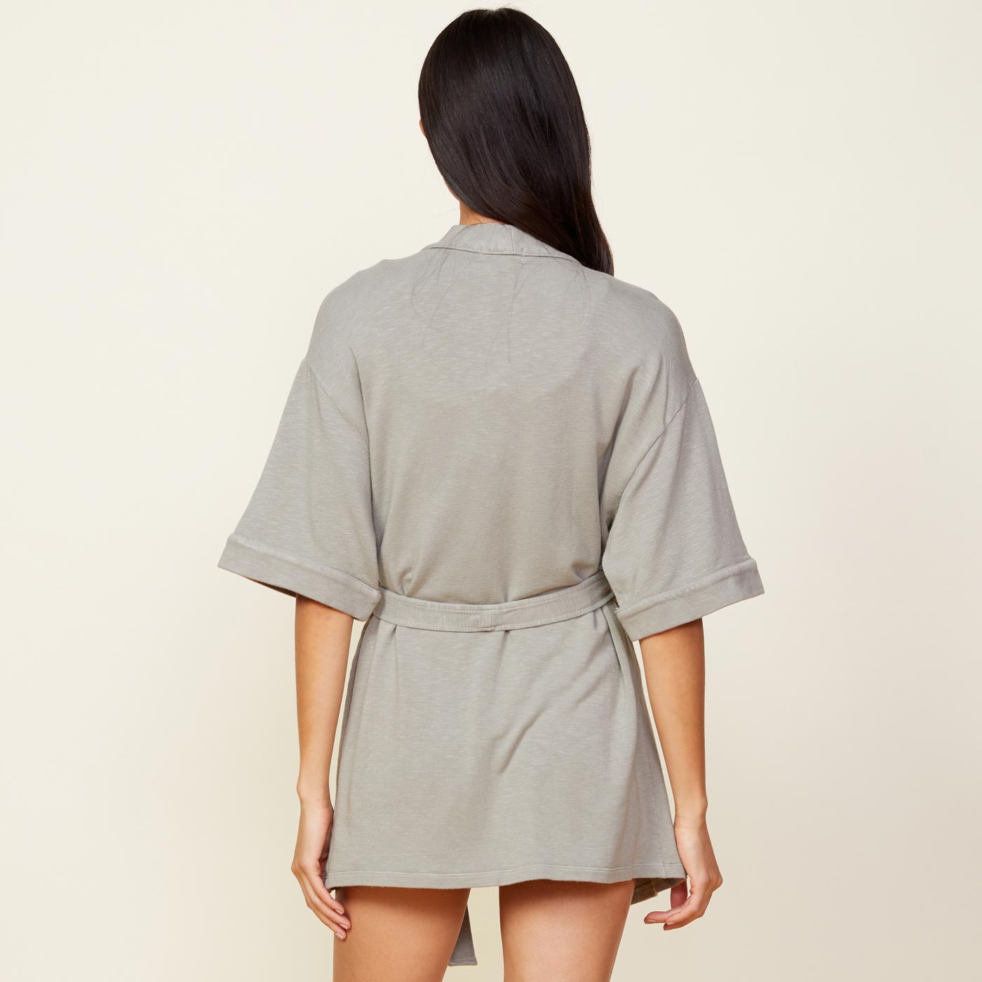 Back view of model wearing the supersoft robe in green tea.