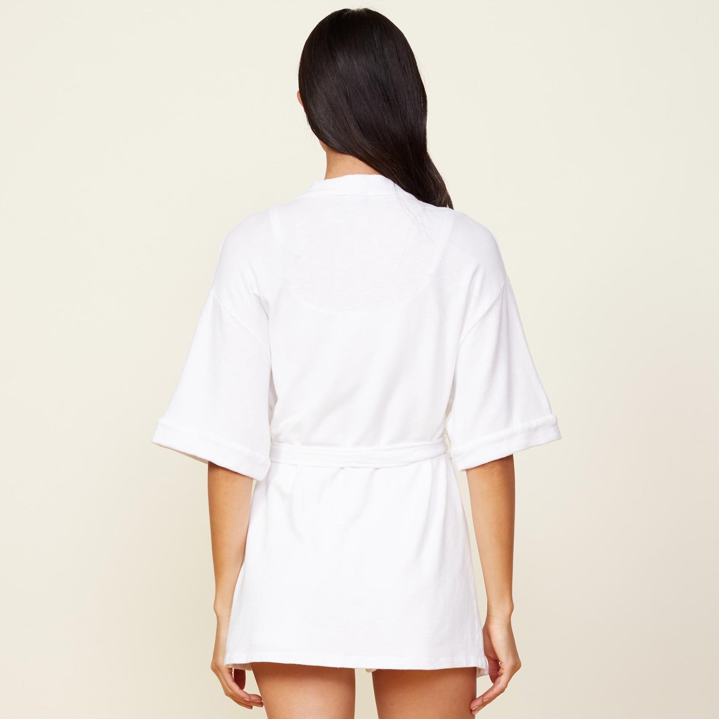 Back view of model wearing the supersoft robe in white.