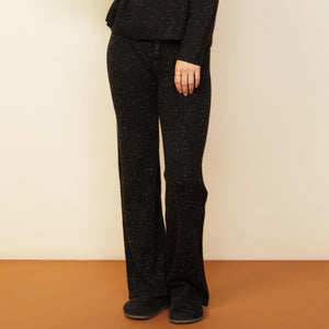 Front view of model wearing the cashmere neps lounge sweats in black.
