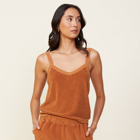 Front view of model wearing the terry cloth tank in coconut.