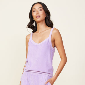 Front view of model wearing the terry cloth tank in lavendula.