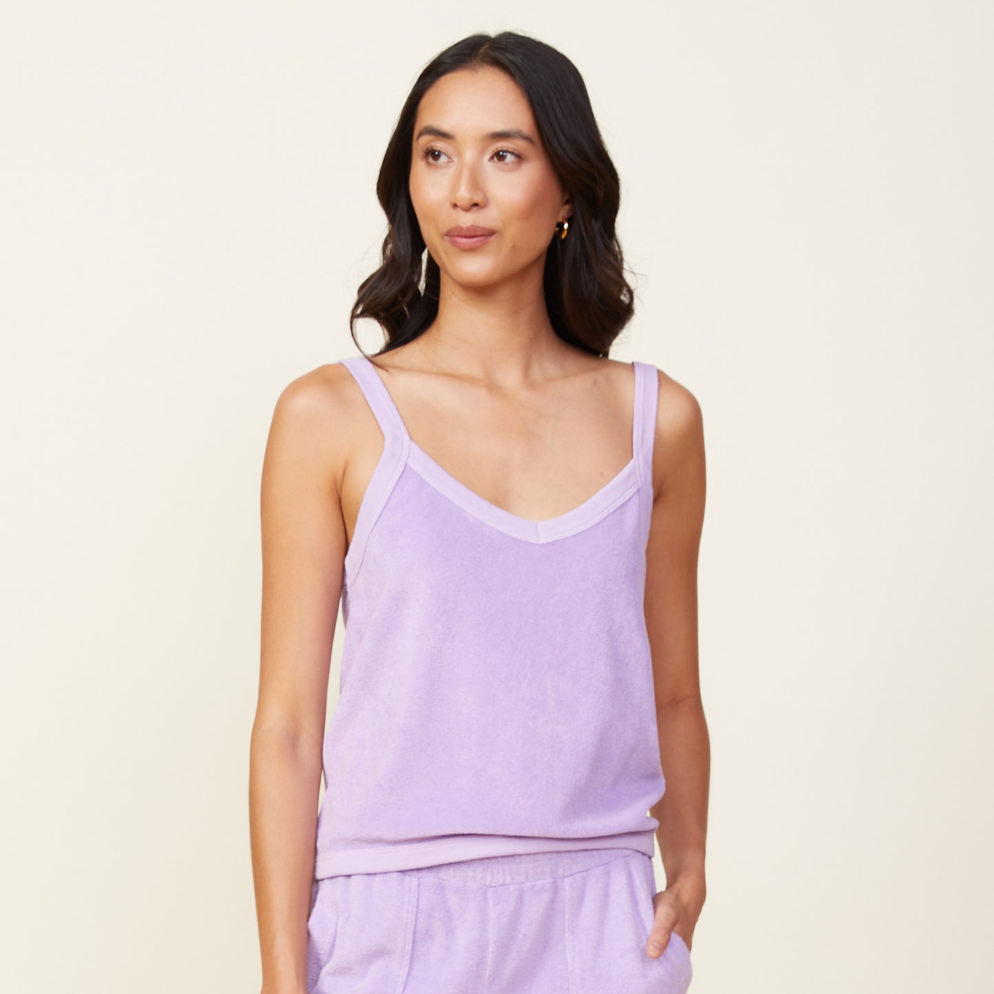 Front view of model wearing the terry cloth tank in lavendula.