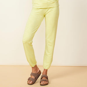 Front view of model wearing the supersoft vintage sweats in citron.
