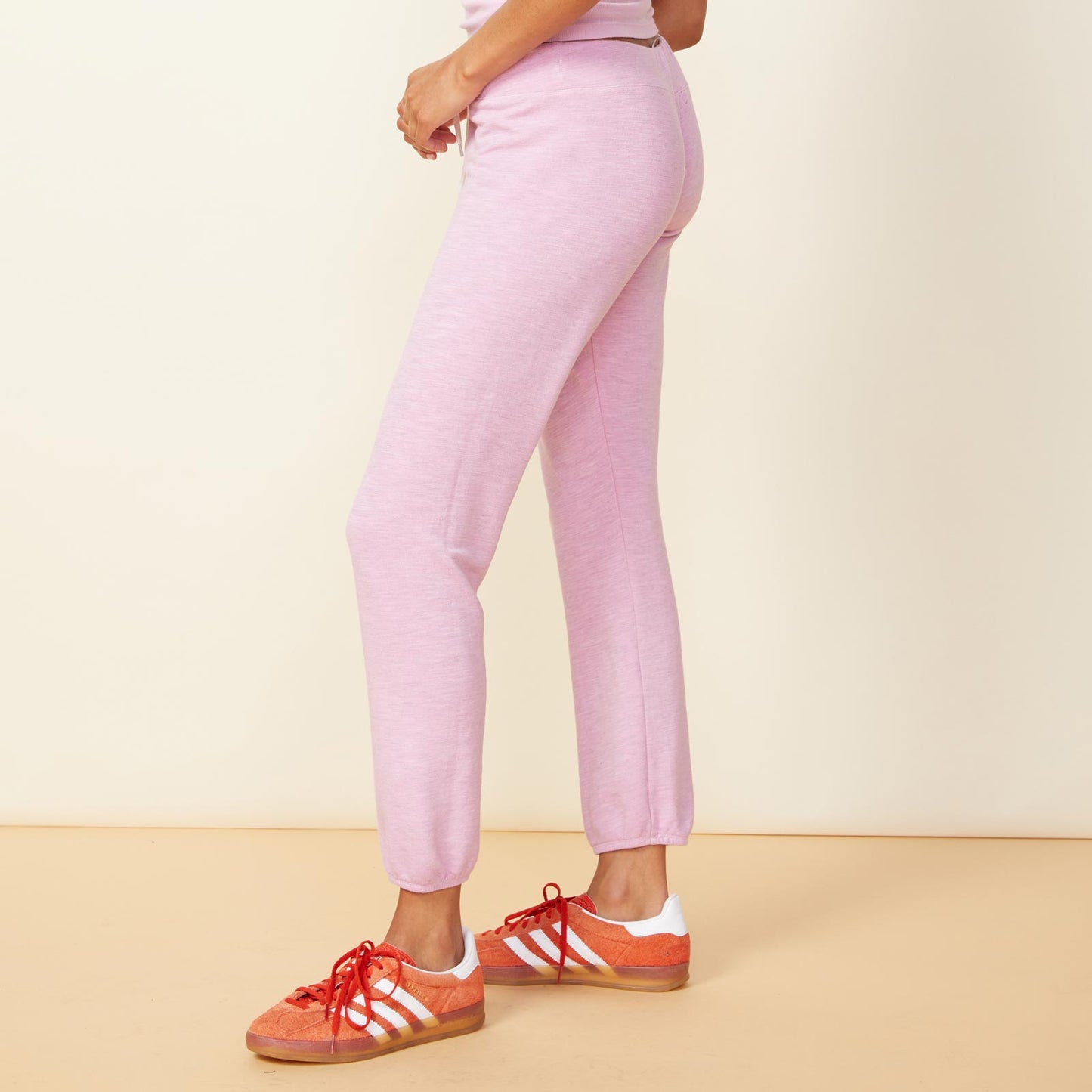 Side view of model wearing the supersoft vintage sweats in pink lavender.