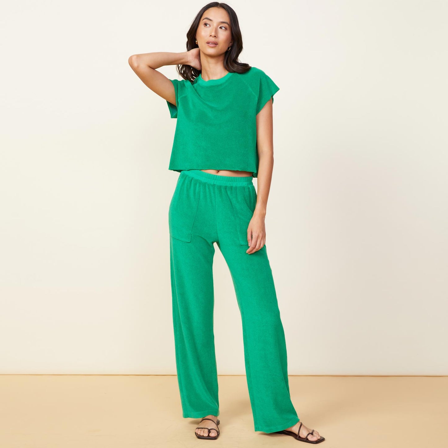 Front view of model wearing the terry cloth patch pocket pant in jungle.