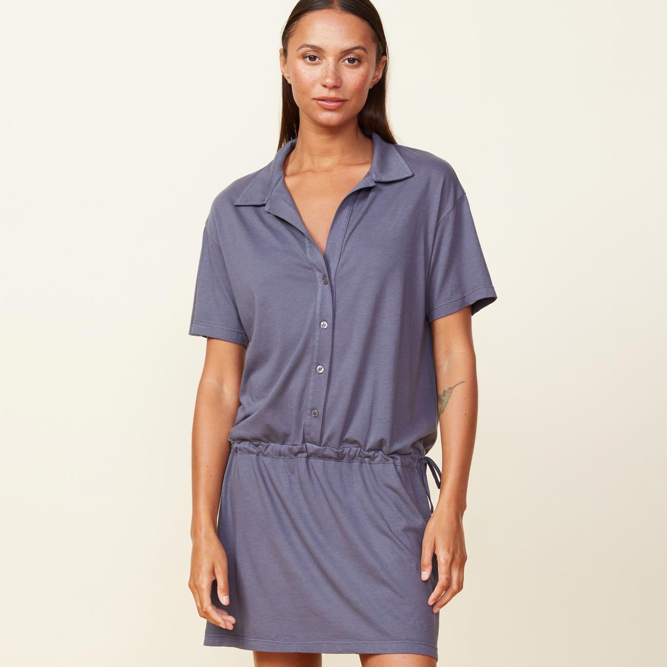 Front view of the model wearing the easy throw on dress in vintage black.