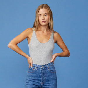 Front view of women in heather grey Narrow Rib Tank Bodysuit
