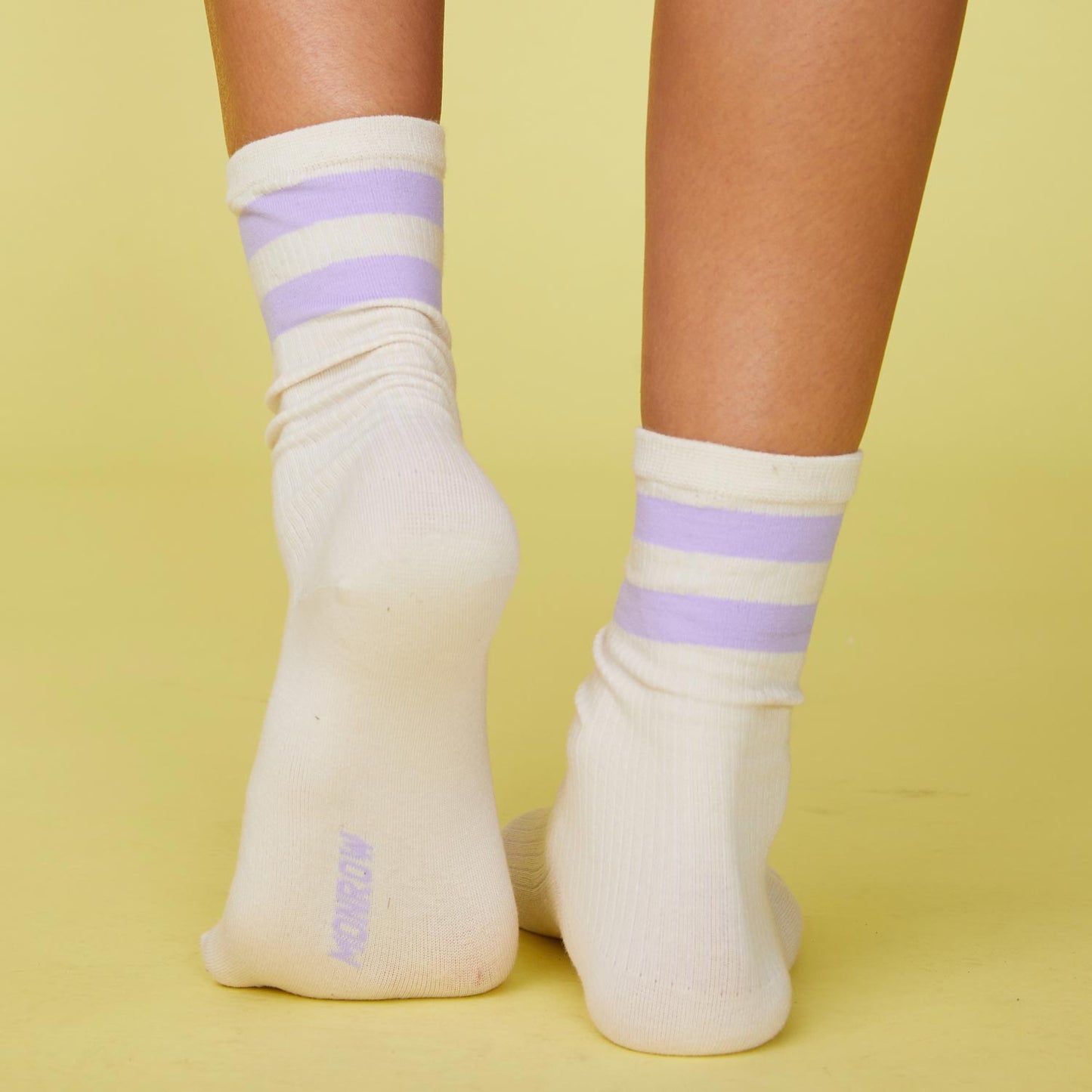 Back view of model's feet wearing the stripe socks in wisteria.