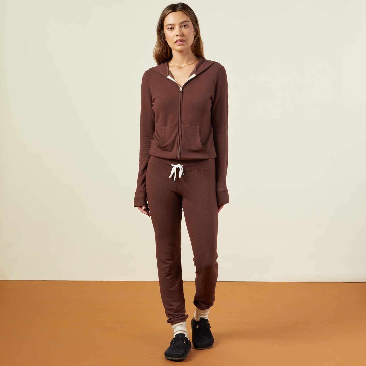 Front view of model wearing the supersoft vintage sweats in dark oak.