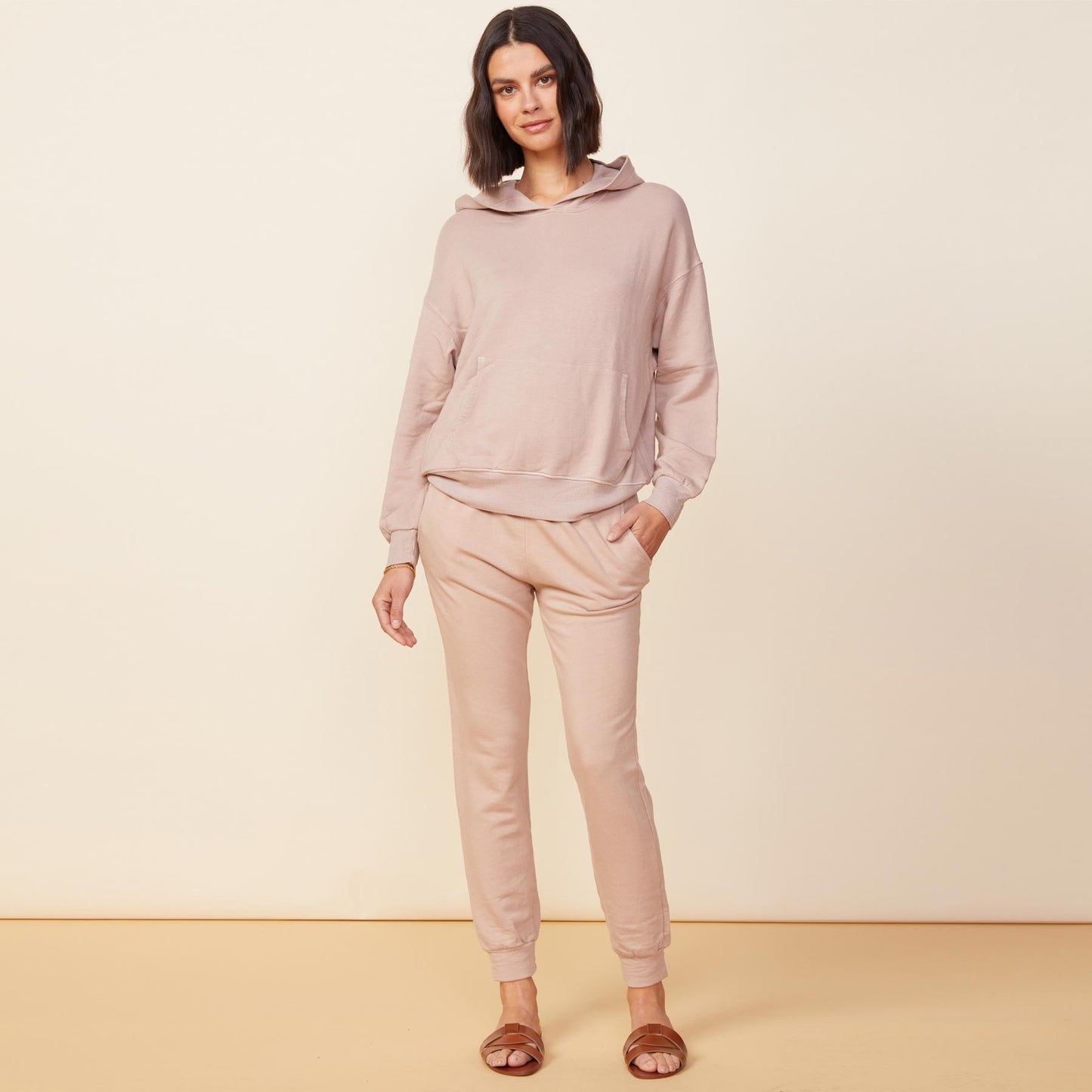 Front view of model wearing the supersoft fleece slouchy pullover in taupe.