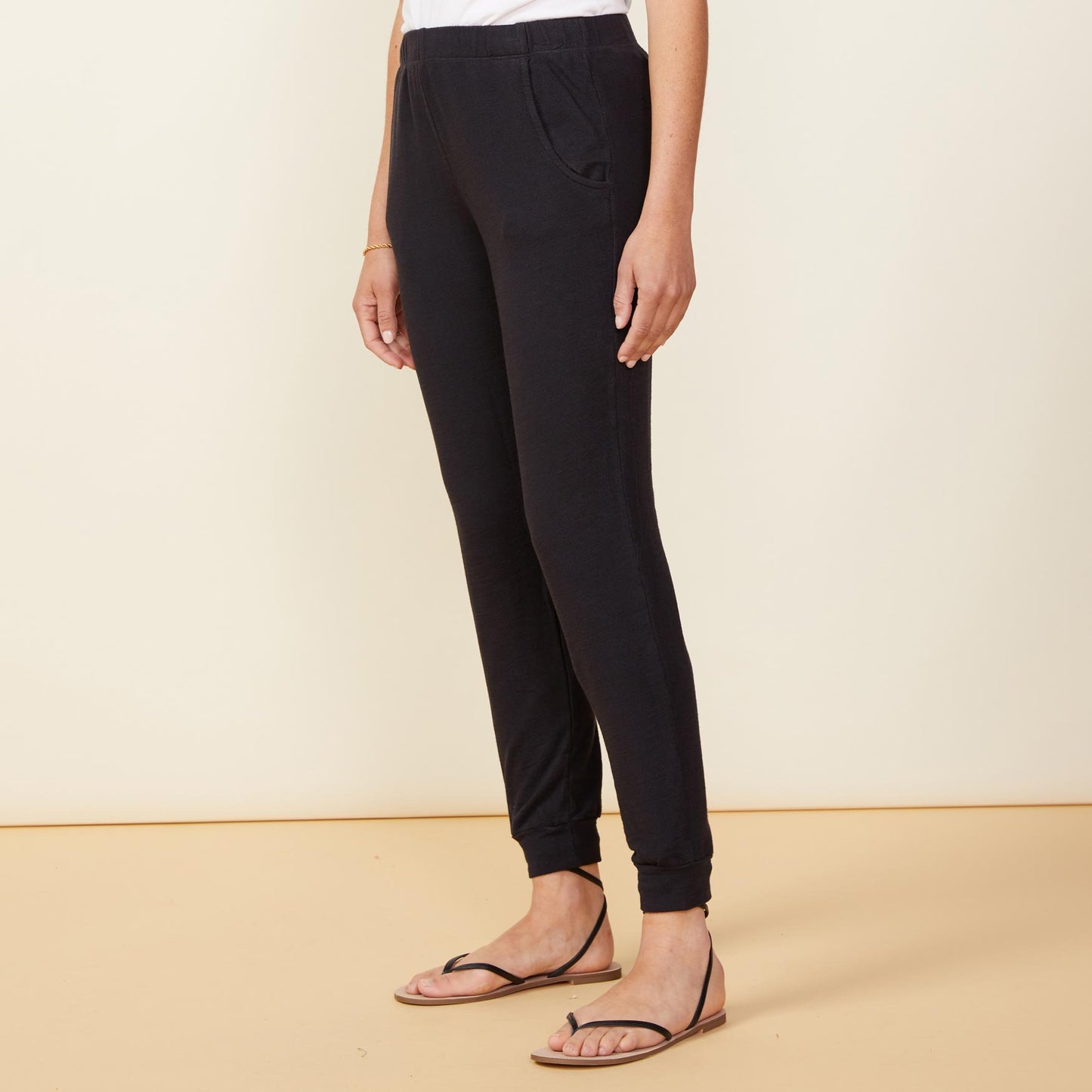 Side view of model wearing the supersoft jogger in faded black.