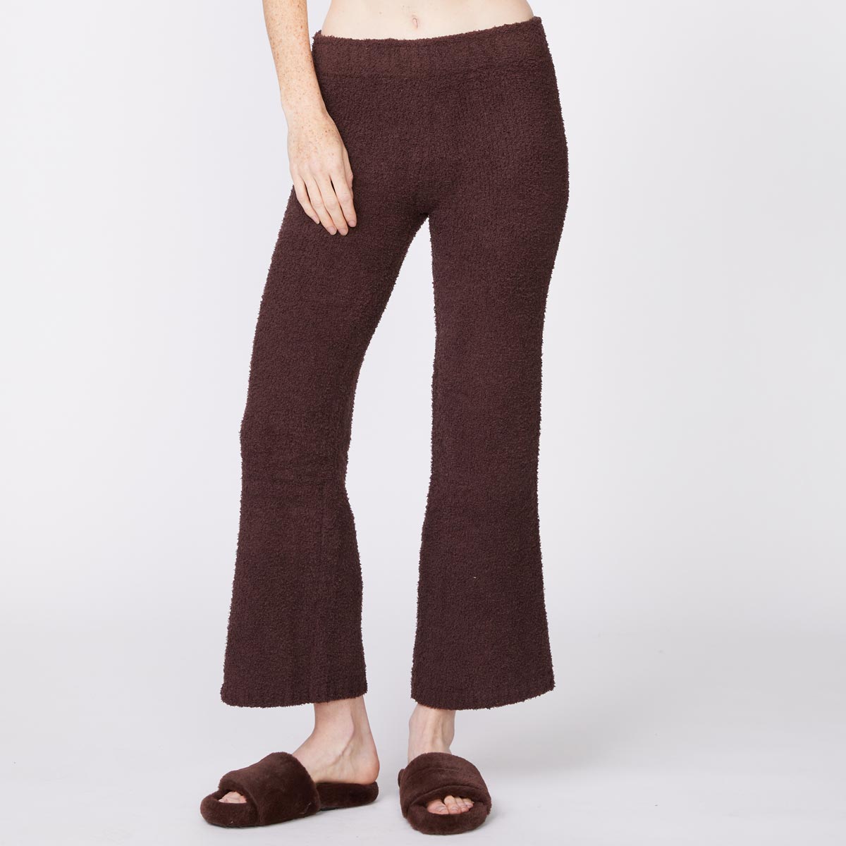 Front view of model wearing the plush sweater pants in cocoa.