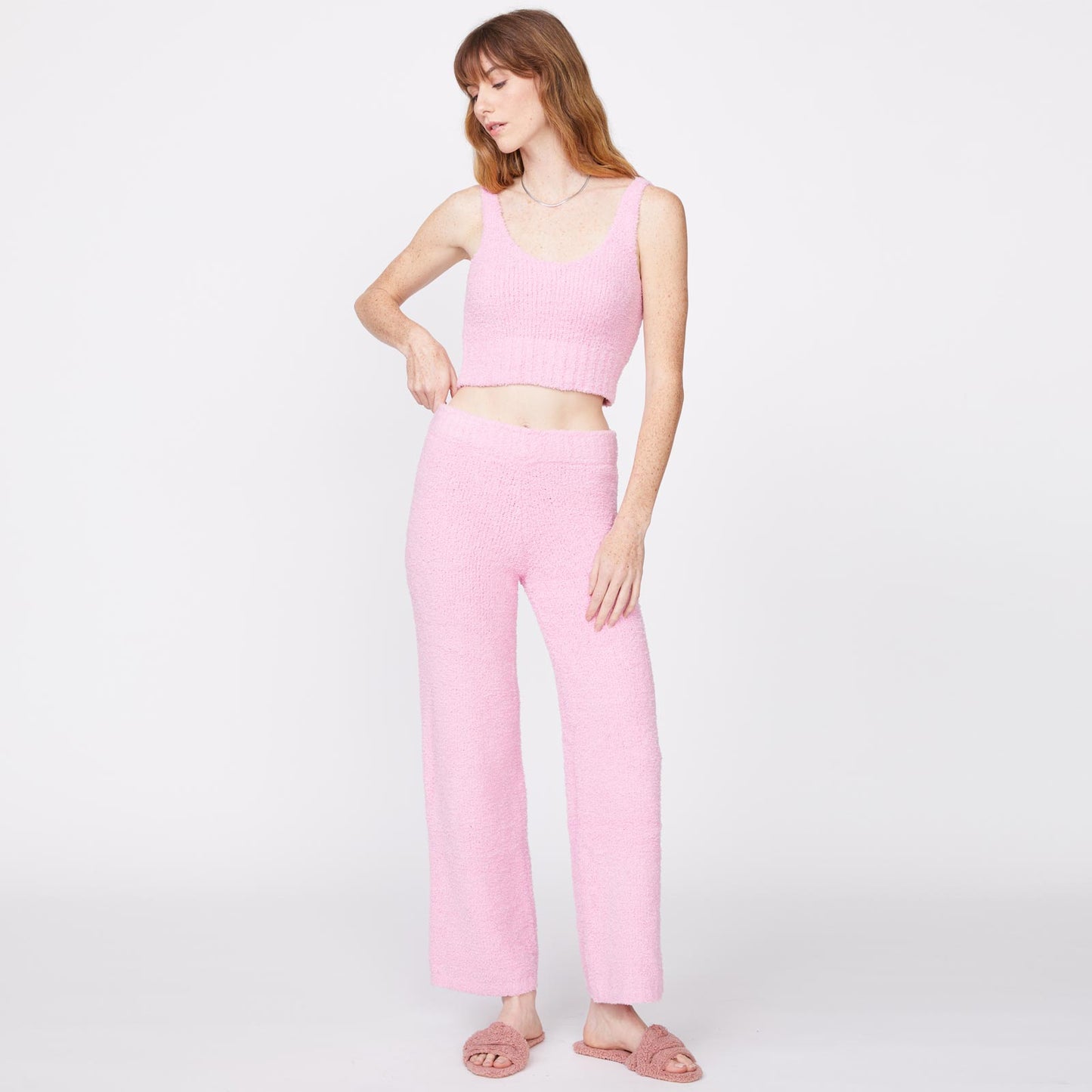 Front view of model wearing the plush sweater tank in orchid.