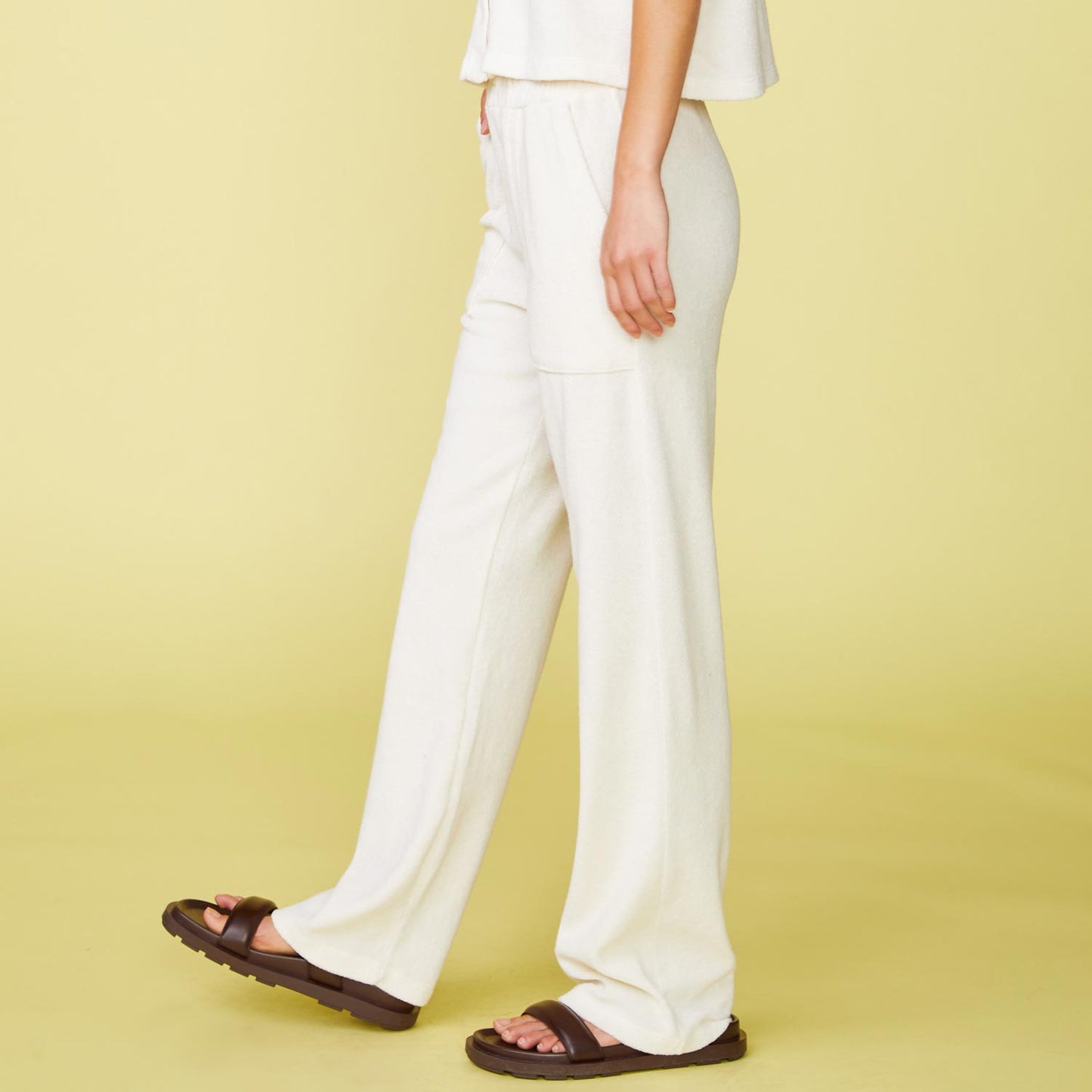 Side View of model wearing the Terry Cloth Patch Pocket Pant in Pearl