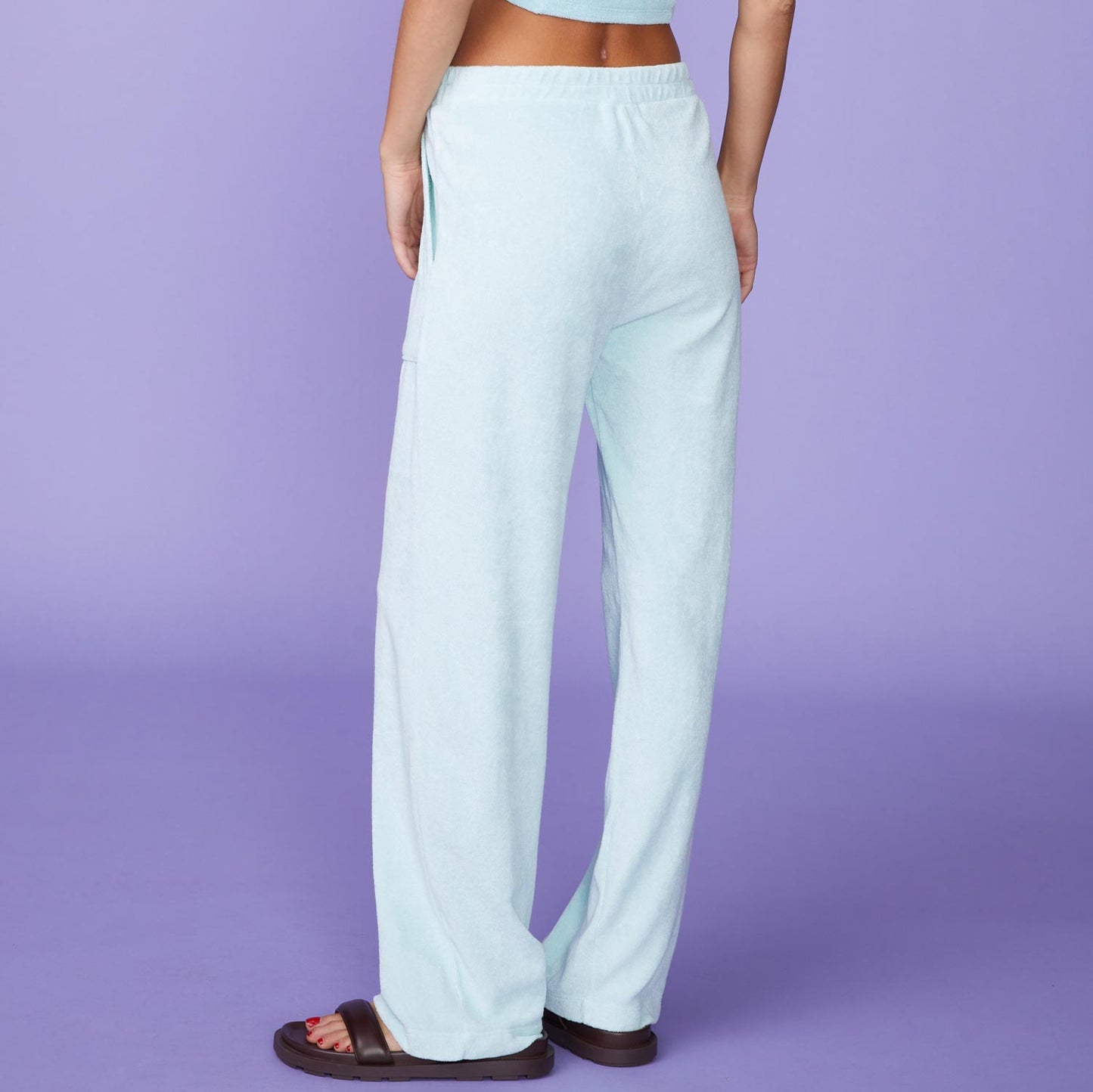 Side View of model wearing the Terry Cloth Patch Pocket Pant in Sea Foam.