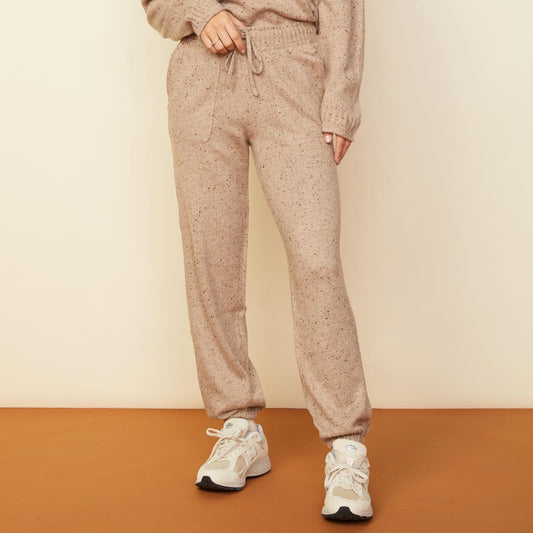 Front view of model wearing the neps vintage sweat in almond.