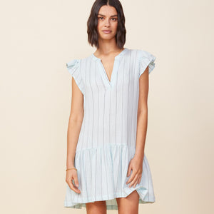 Front view of model wearing the pinstripe gauze easy ruffle dress in sea foam.