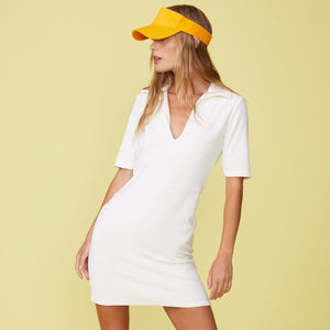 Front View of model wearing the Terry Cloth Polo Dress in Pearl.