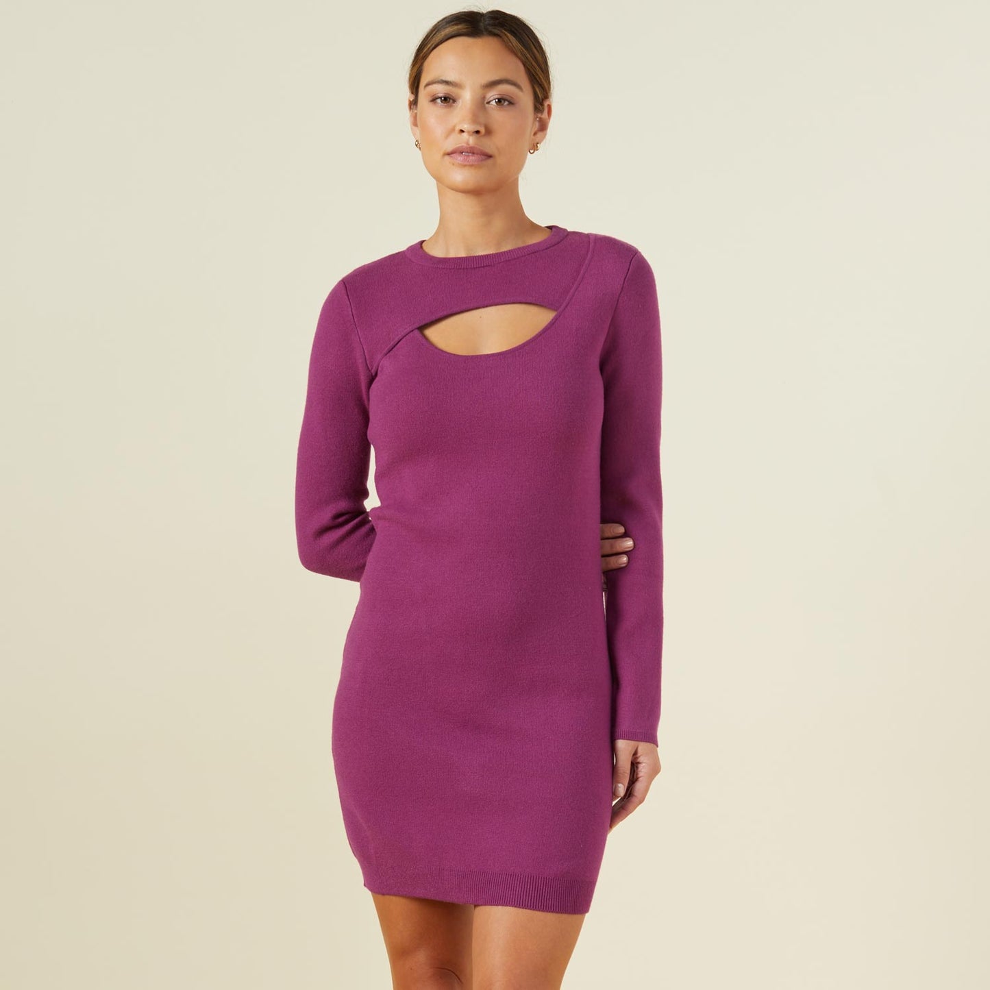 Front view of model wearing the supersoft sweater knit cut out dress in raspberry rose.