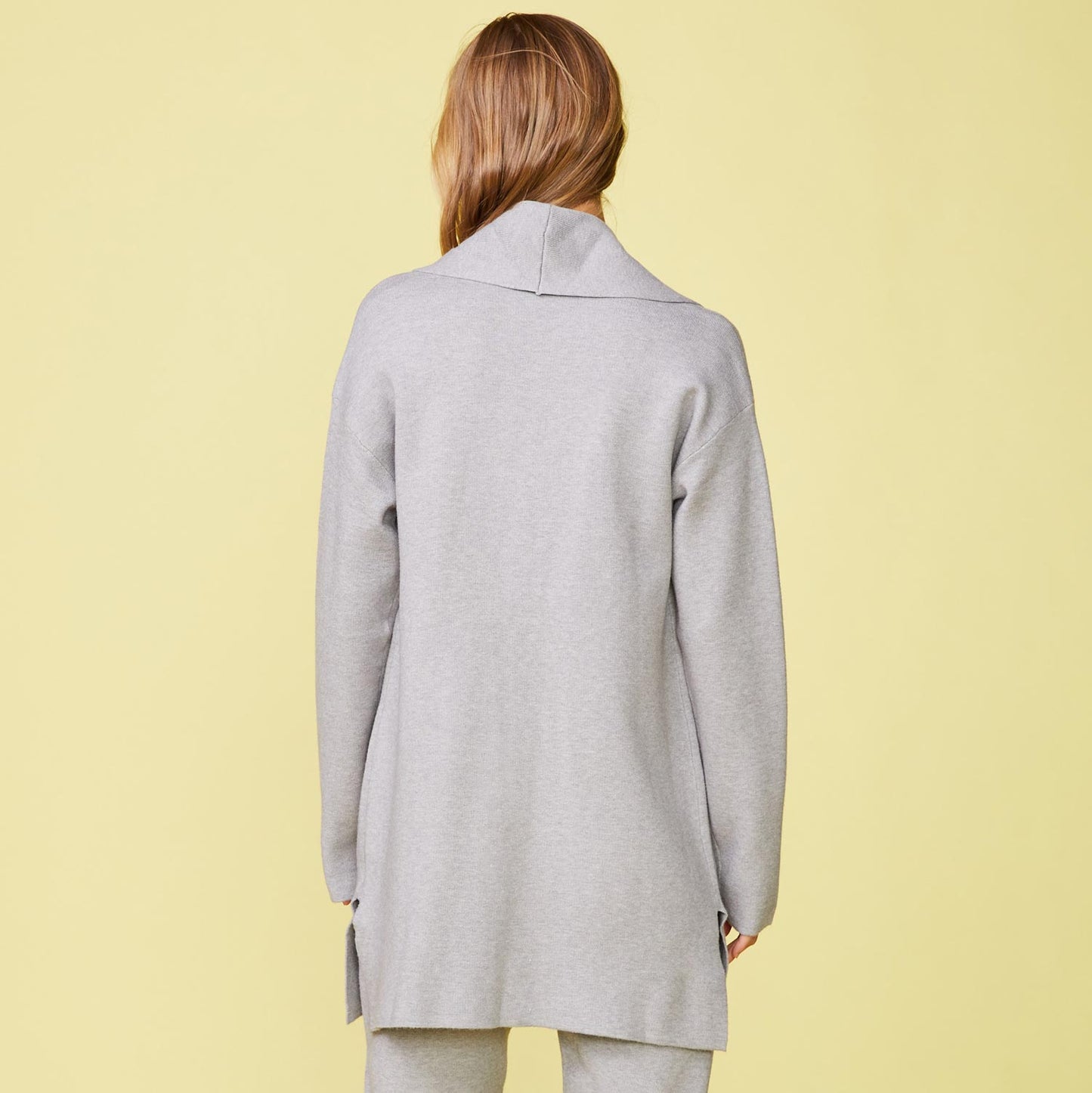 Back view of model wearing the Supersoft Sweater Knit Cardigan in Heather Grey.