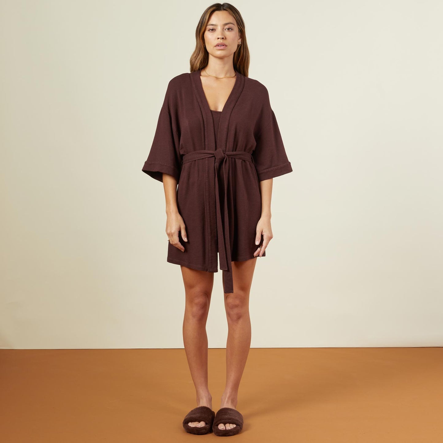 Front view of model wearing the supersoft robe in dark oak.