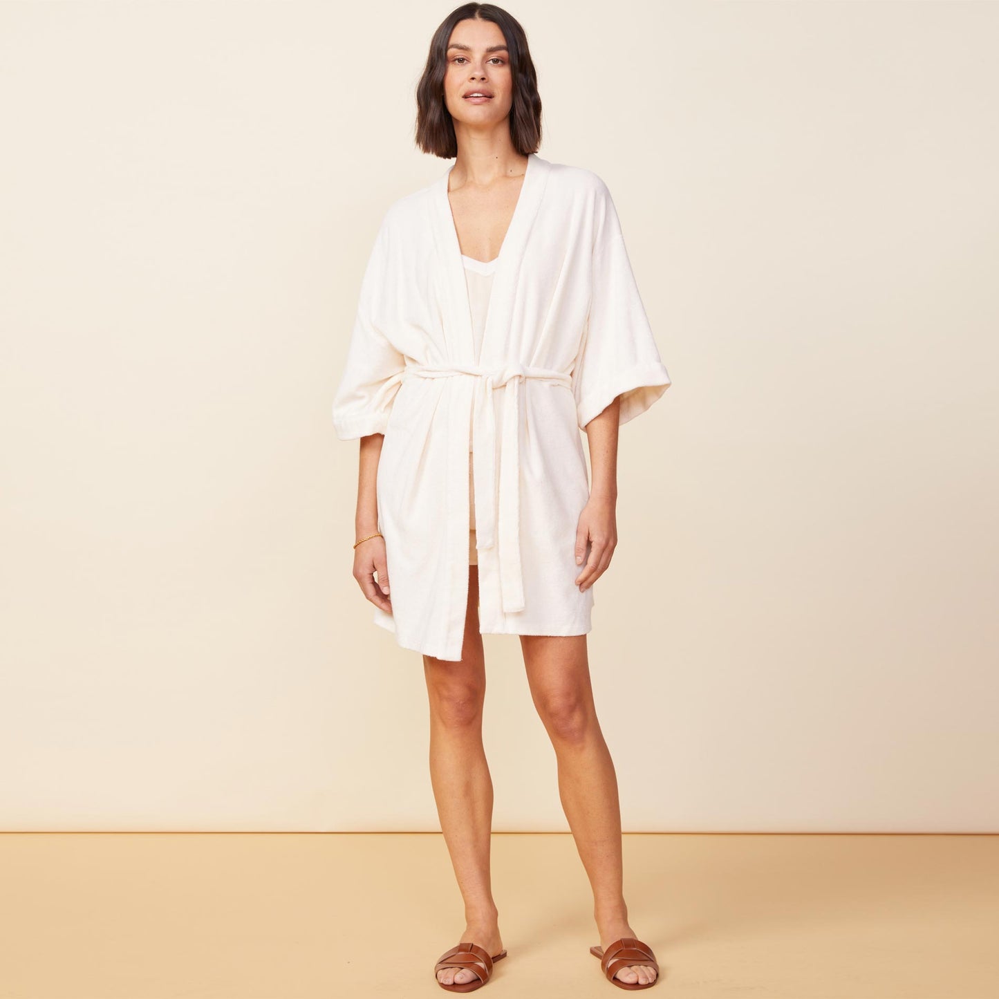 Front view of model wearing the terry cloth kimono in pearl.