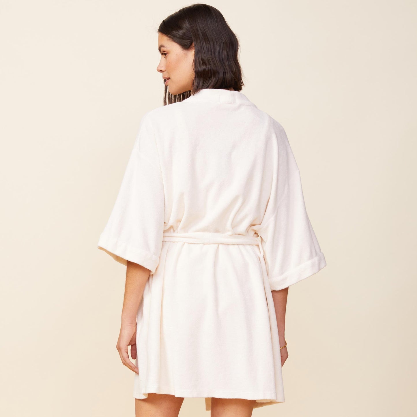 Back view of model wearing the terry cloth kimono in pearl.