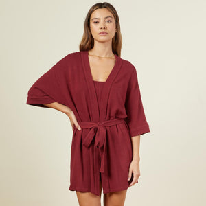 Front view of model wearing the supersoft robe in rhubarb.