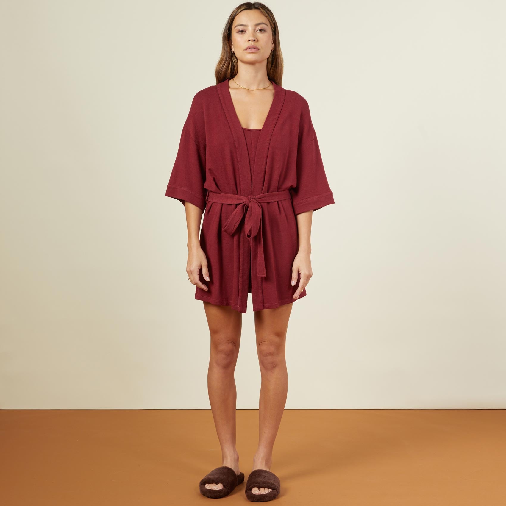 Front view of model wearing the supersoft robe in rhubarb.