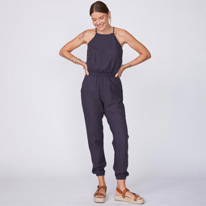 Full View of Model wearing the Woven Jumpsuit in Faded Black