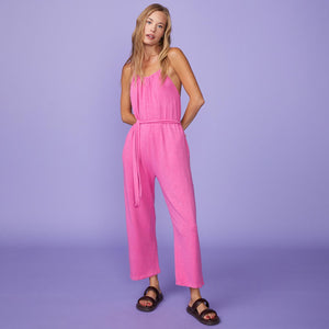 Front View of model wearing the Supersoft Halter Jumpsuit in Rose Bud.