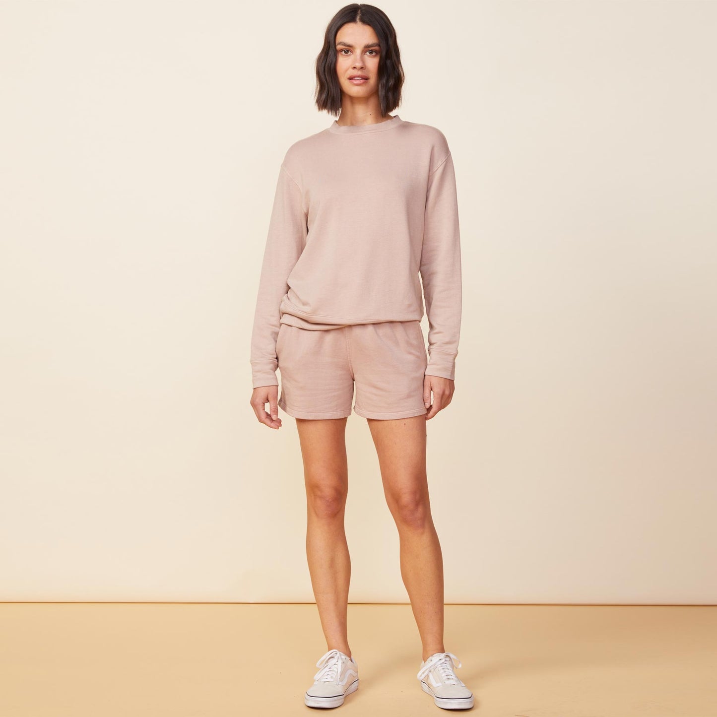 Front view of model wearing the supersoft fleece boyfriend sweatshirt in taupe.