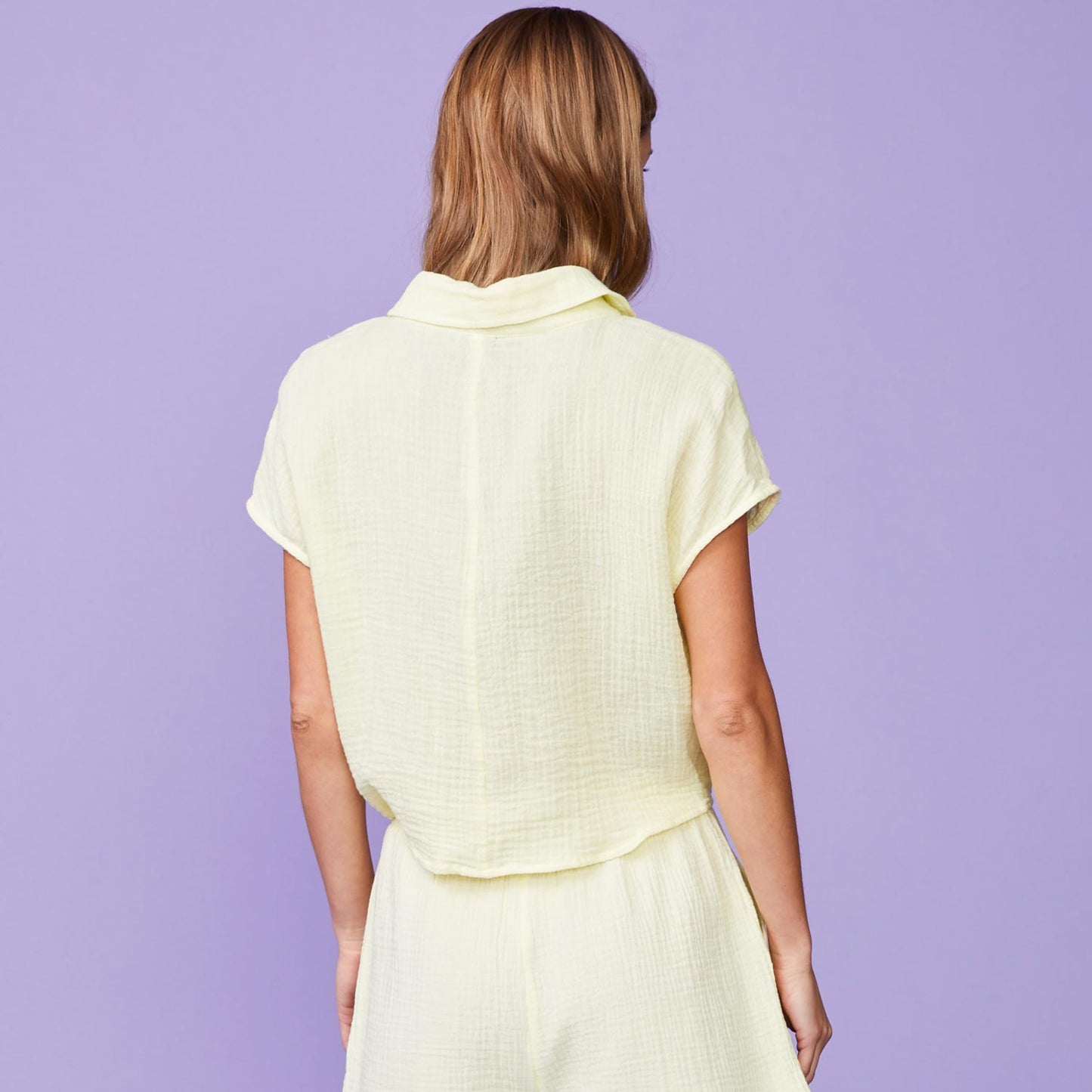 Back View of model wearing the Gauze Short Sleeve Shirt in Lemon