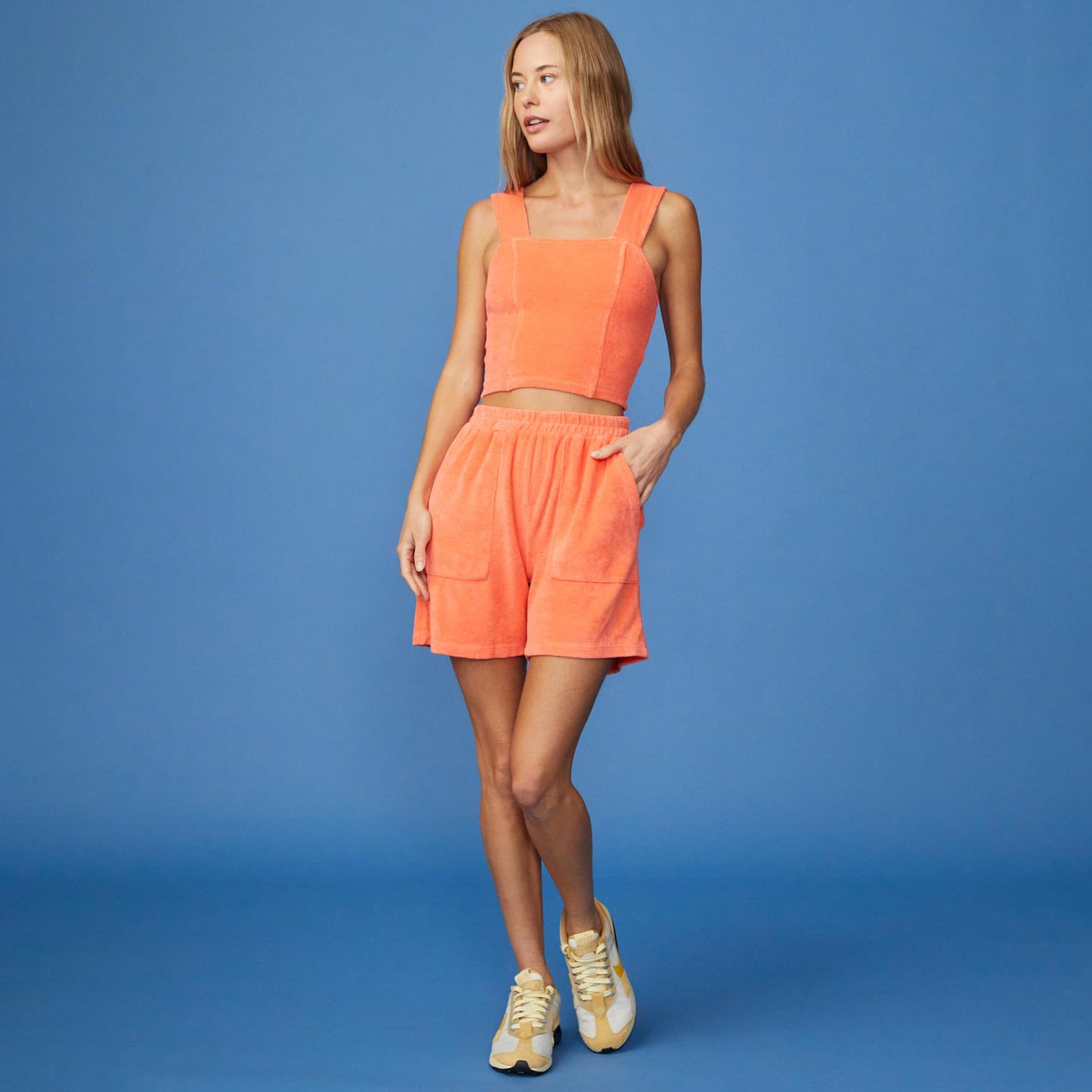 Full View of model wearing the Terry Cloth Cropped Tank in Georgia Peach