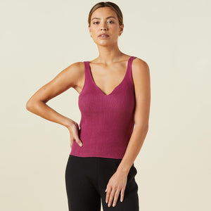 Front view of model wearing the sweater rib tank in raspberry rose.