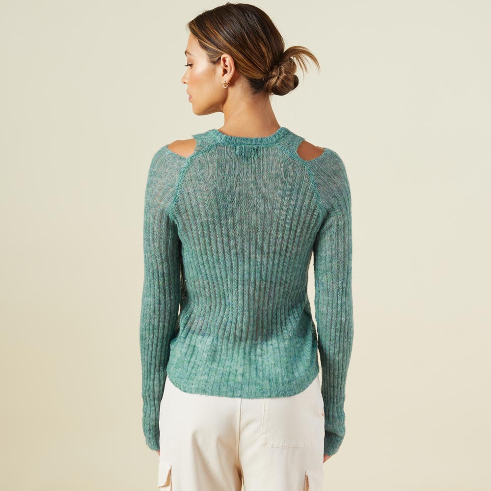 Back view of model wearing the mohair cut out sweater in kale green.