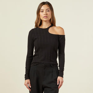 Front view of model wearing the flat rib asymmetric long sleeve in black.