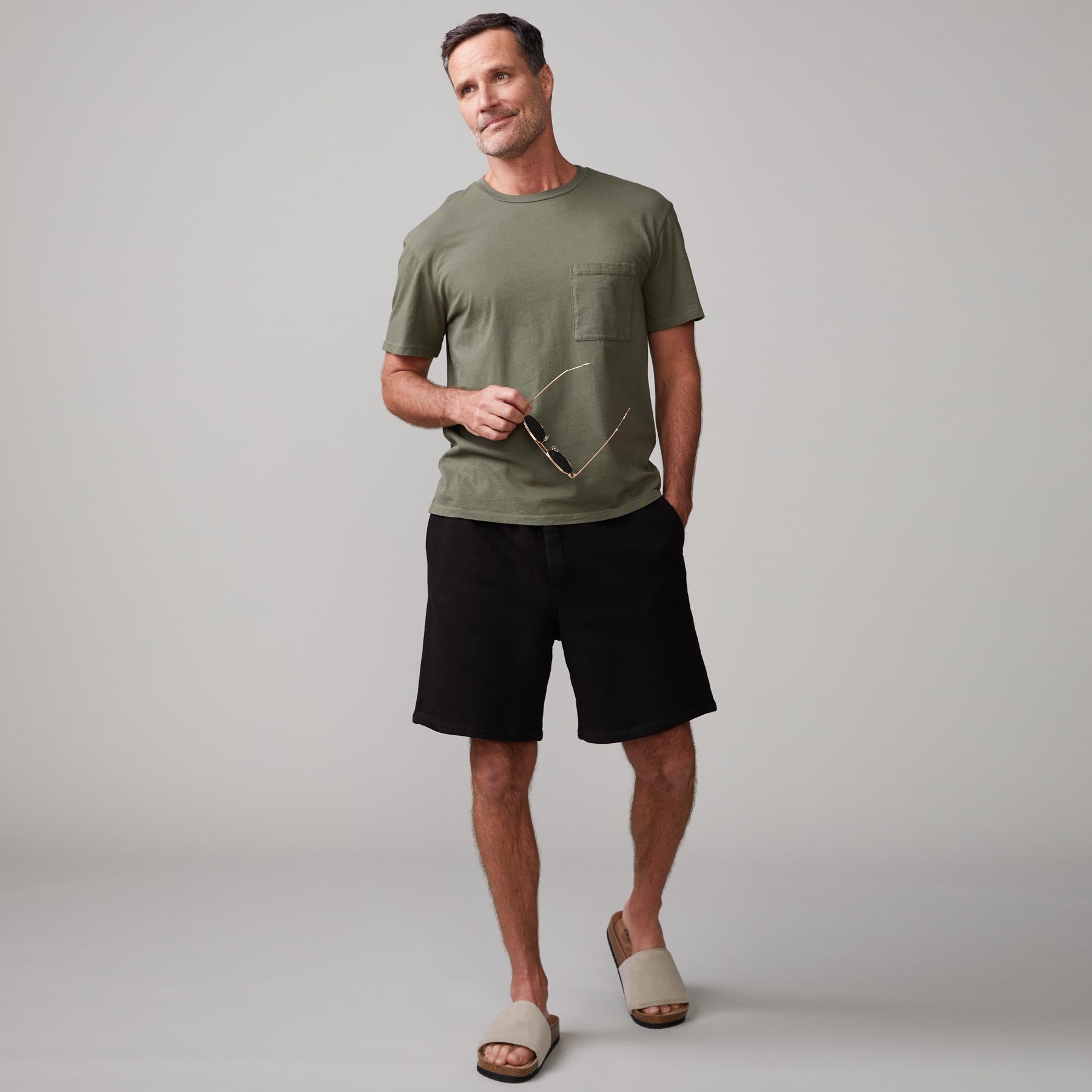 Front view of model wearing the 70's shorts in black.