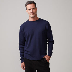 Front view of model wearing the thermal long sleeve crew in indigo.